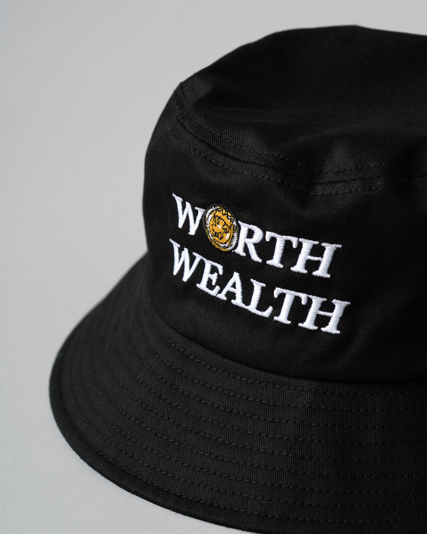 Worth over Wealth Signature Bucket Hat (Black)