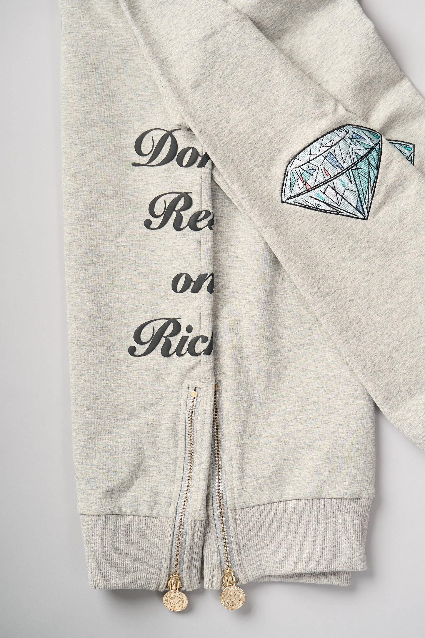 "Don't Rest on Riches" Half-Zip Sweater (Diamond Patches)