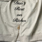 "Don't Rest on Riches" Half-Zip Sweater (Diamond Patches)