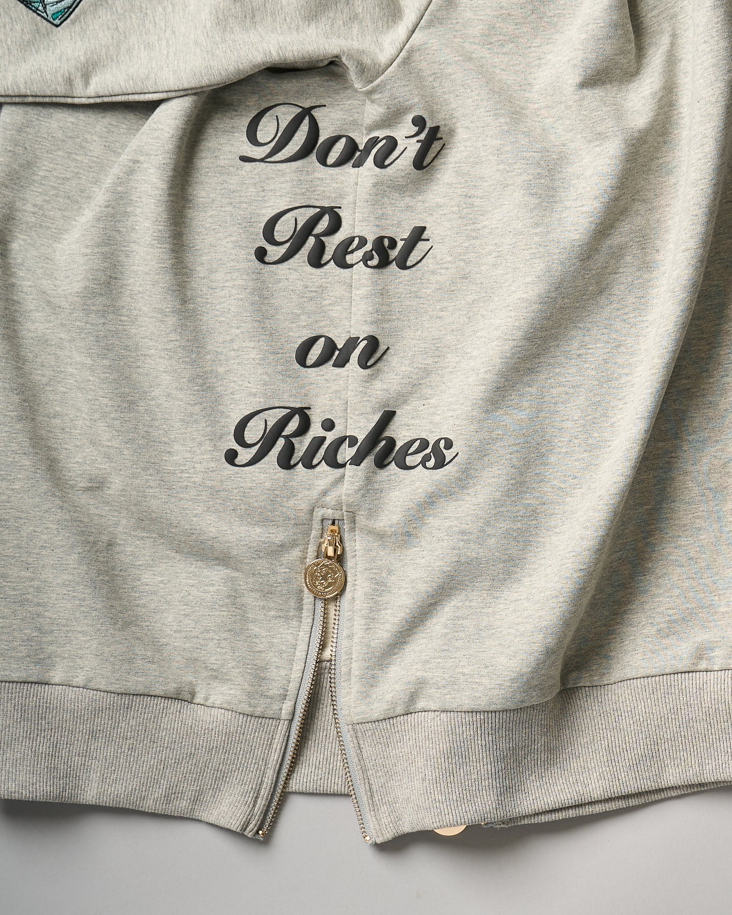 "Don't Rest on Riches" Half-Zip Sweater (Diamond Patches)